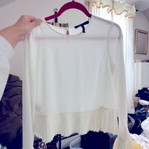 long sleeve white blouse with pleated sleeves and bottom